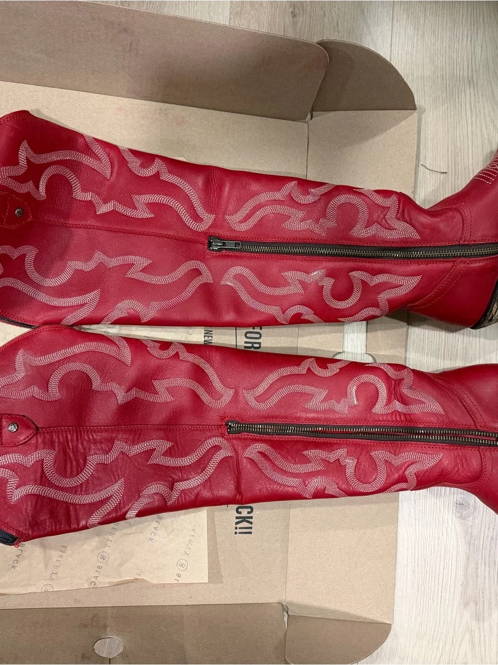 Liberty Black Over the knee Red boots